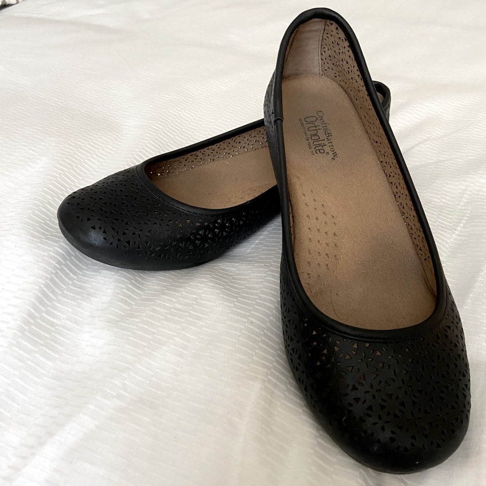 Black flats with cutout design
